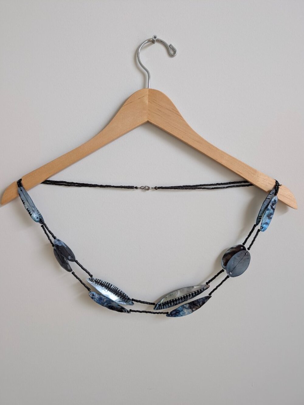 Very long vibrant blue and black shell beaded necklace or dangle belt